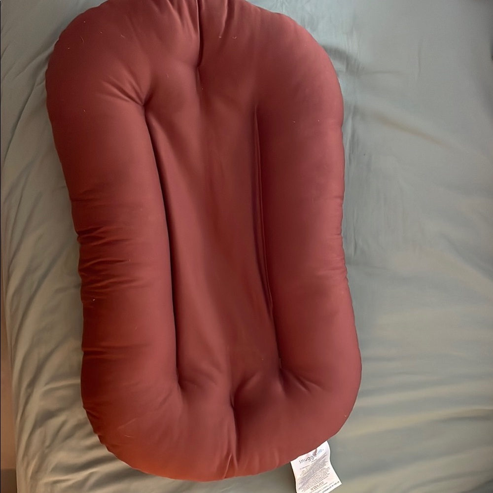 Snuggle Me brick coloured baby Cushion